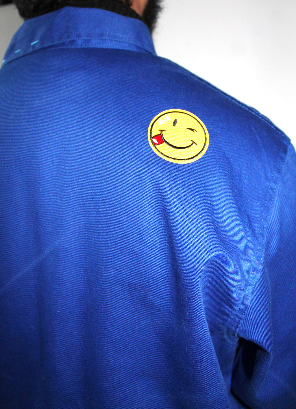 Smiley homme bleu de travail